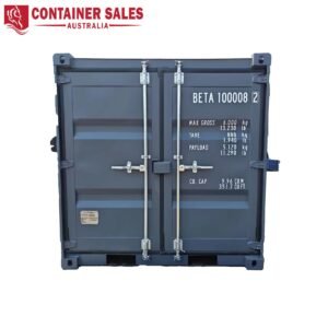 Rear view of a dark blue shipping container with two vertical door rods and white data markings on the right door, plus a Container Sales Australia logo in the top-left corner.