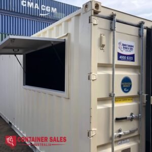 White shipping container with an open side window hatch in a container yard; blue CMA CGM container behind it and logos for Hunter Container Rental & Sales and Container Sales Australia visible.